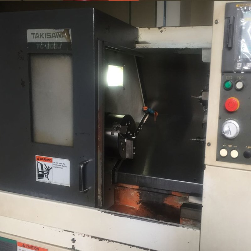 mesin bubut cnc takisawa